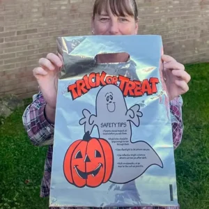 Delivering Trick or Treat Safety Bags to Local Schools